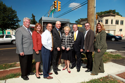 The Monmouth County Board of Chosen Freeholders are joined by Red Bank officials at the activation ceremony of a new traffic signal at the intersection of Shrewsbury Avenue and Drs. James Parker Boulevard on Sept. 17, 2014 in Red Bank, NJ. Pictured left to right: Administrator Stanley Sickels, Councilwoman Cindy Burnham, Freeholder Thomas A. Arnone, Freeholder John P. Curley, Freeholder Director Lillian G. Burry, Mayor Pasquale Menna, Councilman Edward Zipprich and Freeholder Serena DiMaso.