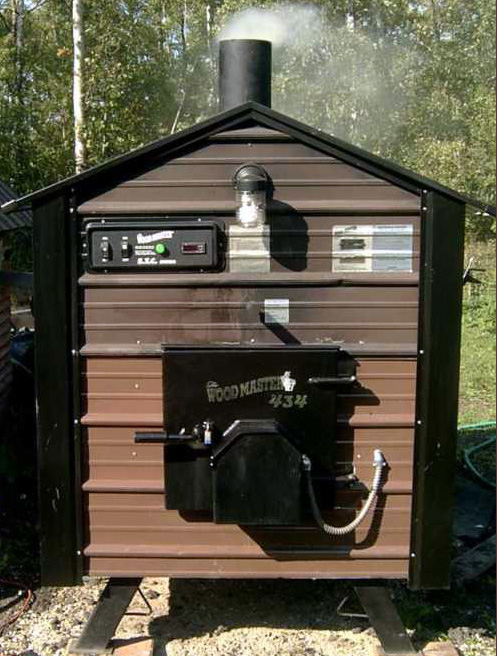 An outdoor woodburing boiler