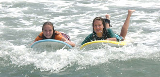 Surfers at Seven Presidents Oceanfront Park