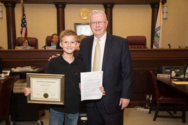 First-place winner history essay winner Andre Goodman, of Indian Hill School in Holmdel, with Historical Commission board member Glenn Cashion.