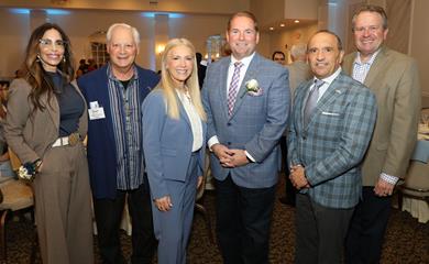 Clerk Hanlon, Sheriff Golden, Director Arnone and Commissioner Anderson with others
